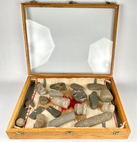 Native American Artifacts in Display Case with Southwestern Textile