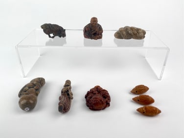 Collection of Nine Miniature Carved Netsuke and Beads