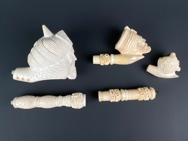 Group of Five Carved Meerschaum Pipe Bowls with Figural and Floral Motifs