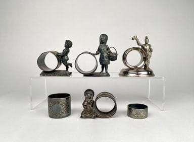 Six Figural and Decorative Metal Napkin Rings