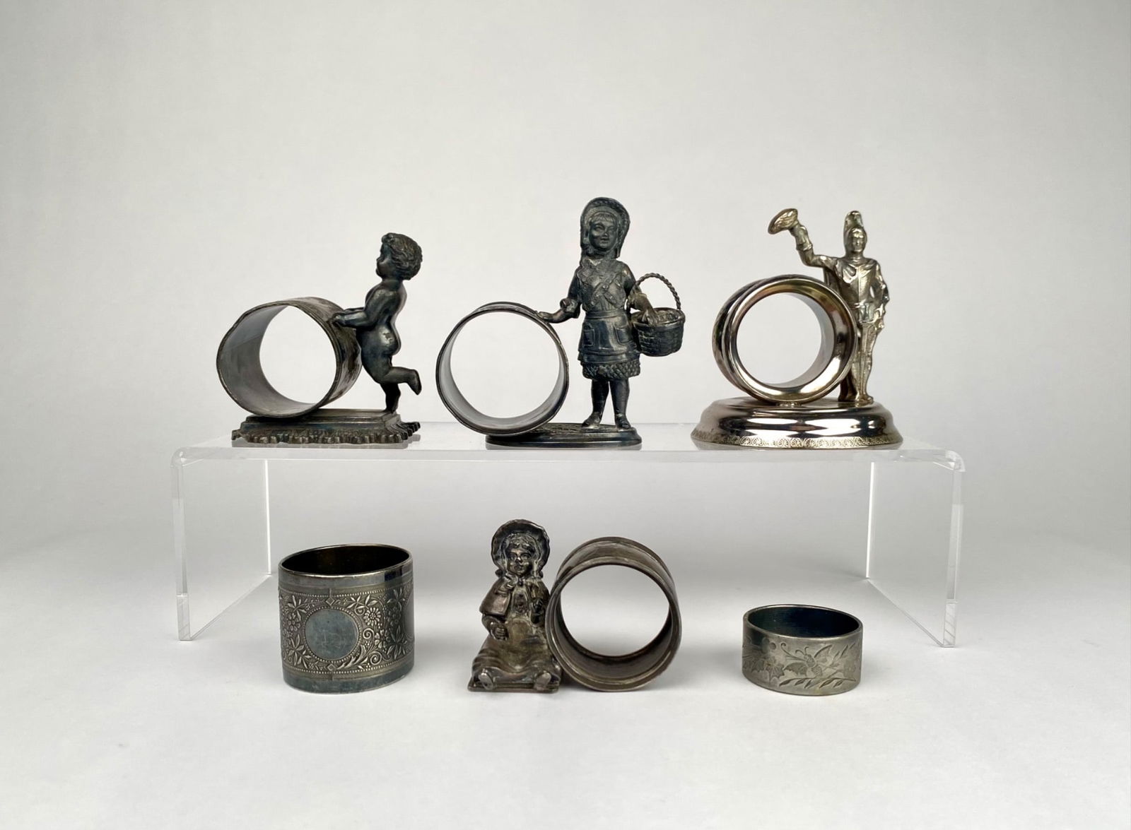 MERIDEN Six Figural and Decorative Metal Napkin Rings (1 of 11)
