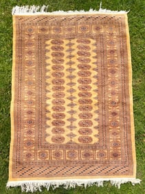Handmade Oriental Rug With Geometric and Floral Patterns