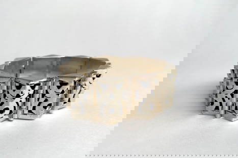 Sterling Silver Mexican Panel Bracelet with Geometric Design: Sterling silver panel bracelet featuring intricate geometric cutout designs. The bracelet is marked 925 and MEXICO, indicating its silver content and origin. It features a secure clasp mechanism and