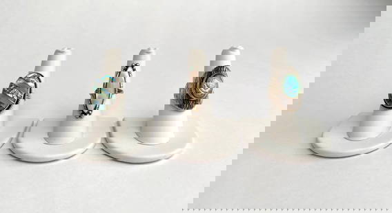 3 Sterling Silver Rings Featuring Inlay and Stone Accents: Three sterling silver rings, each featuring unique designs. Includes, one ring with abalone and mother of pearl inlay set in an oval bezel, one elongated pink mother of pearl cabochon surrounded by a