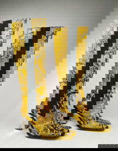 Italian Yellow Python Print Knee High Boots (Size 40): Womens knee high boots crafted from yellow python effect leather. Featuring black elastic side panels for a comfortable fit and square toes. The heels are metallic with a polished finish. Marked Vero