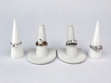 Lot of Four Sterling Silver and Cubic Zirconia Rings