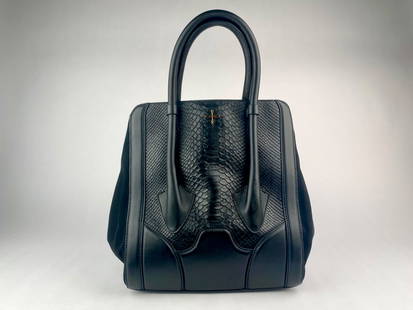 Pour La Victoire Black Leather and Embossed Python Tote Handbag: Structured black handbag by Pour La Victoire. The body combines smooth black leather, black suede side panels, and an embossed python-style leather front. The structured rolled handles are crafted in
