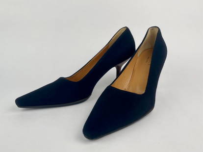 Gucci Black Wool Pointed Toe Pumps with Wood Stiletto Heel (Size 10): Pair of black wool-covered pumps by Gucci. Designed with a refined pointed toe and a sleek silhouette, these heels feature stacked wooden stilettos. Made in Italy, the insoles are tan leather stamped