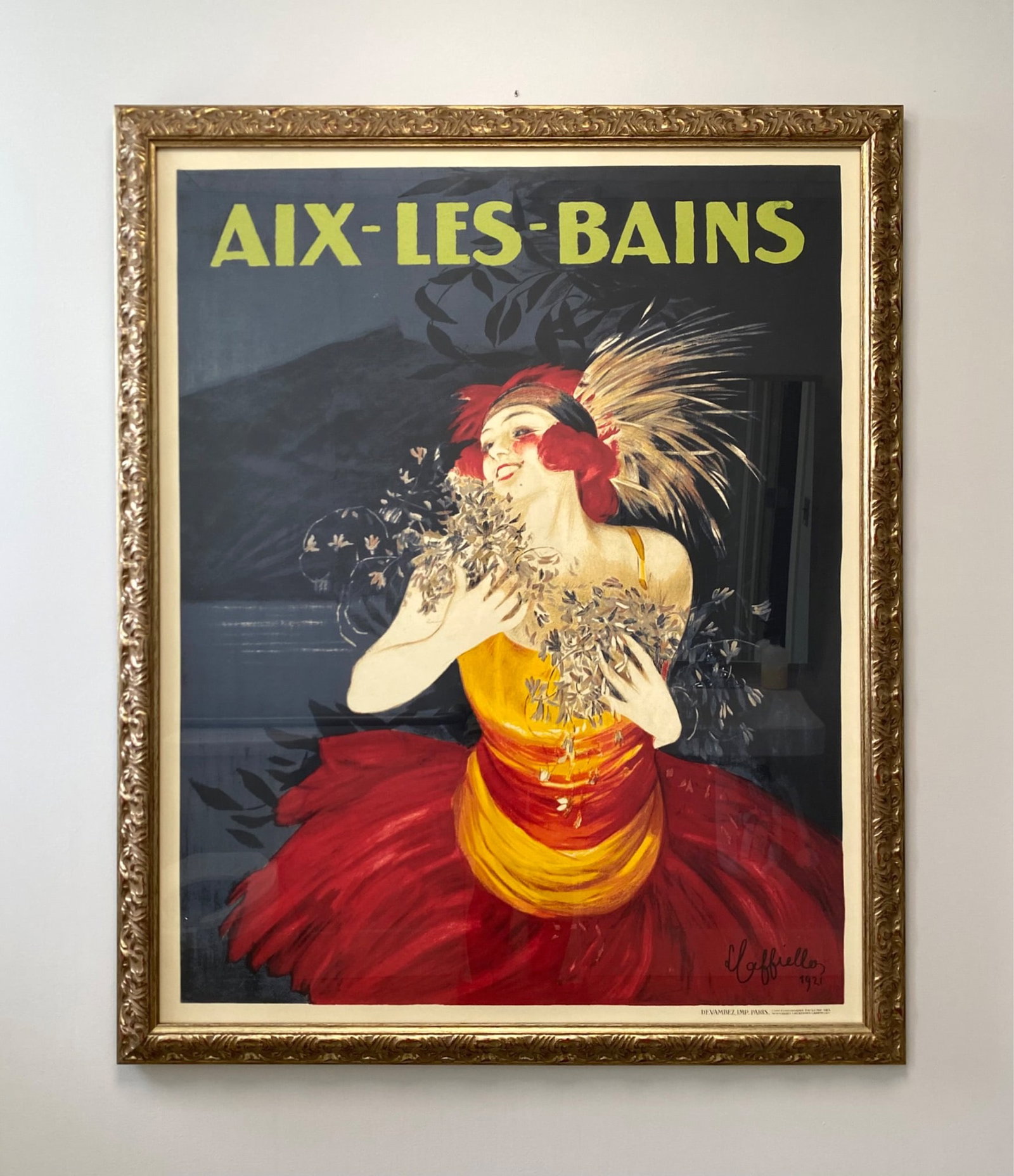 1921 Aix-Les-Bains Poster by L. Gaffiello in Ornate Gold Frame: 1921 Aix-Les-Bains poster designed by artist L. Gaffiello. Features bold colors depicting a floral-clad female figure against a dark backdrop. Published by Devambez, Imp. Paris, with marks indicating 