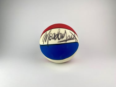 Meadowlark Lemon Signed Red, White & Blue Basketball