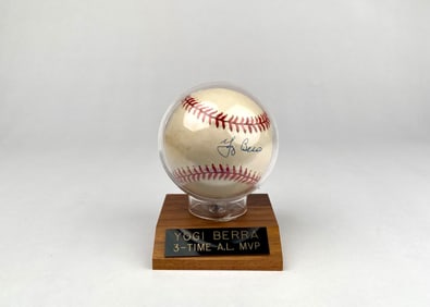 Yogi Berra Autographed Baseball with Display Stand