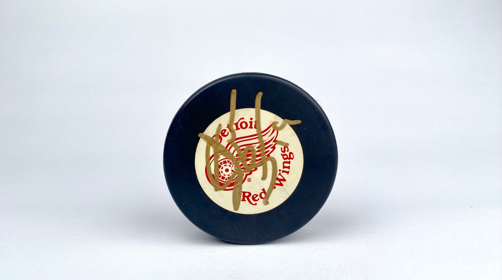 Official NHL Detroit Red Wings Hockey Puck Signed by Steve Yzerman (1 of 6)