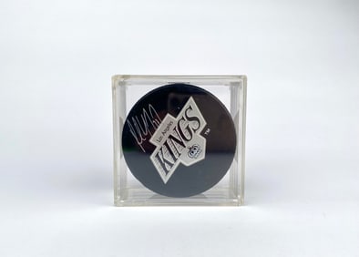Signed Kings NHL Official Game Puck Signed by Paul Coffey