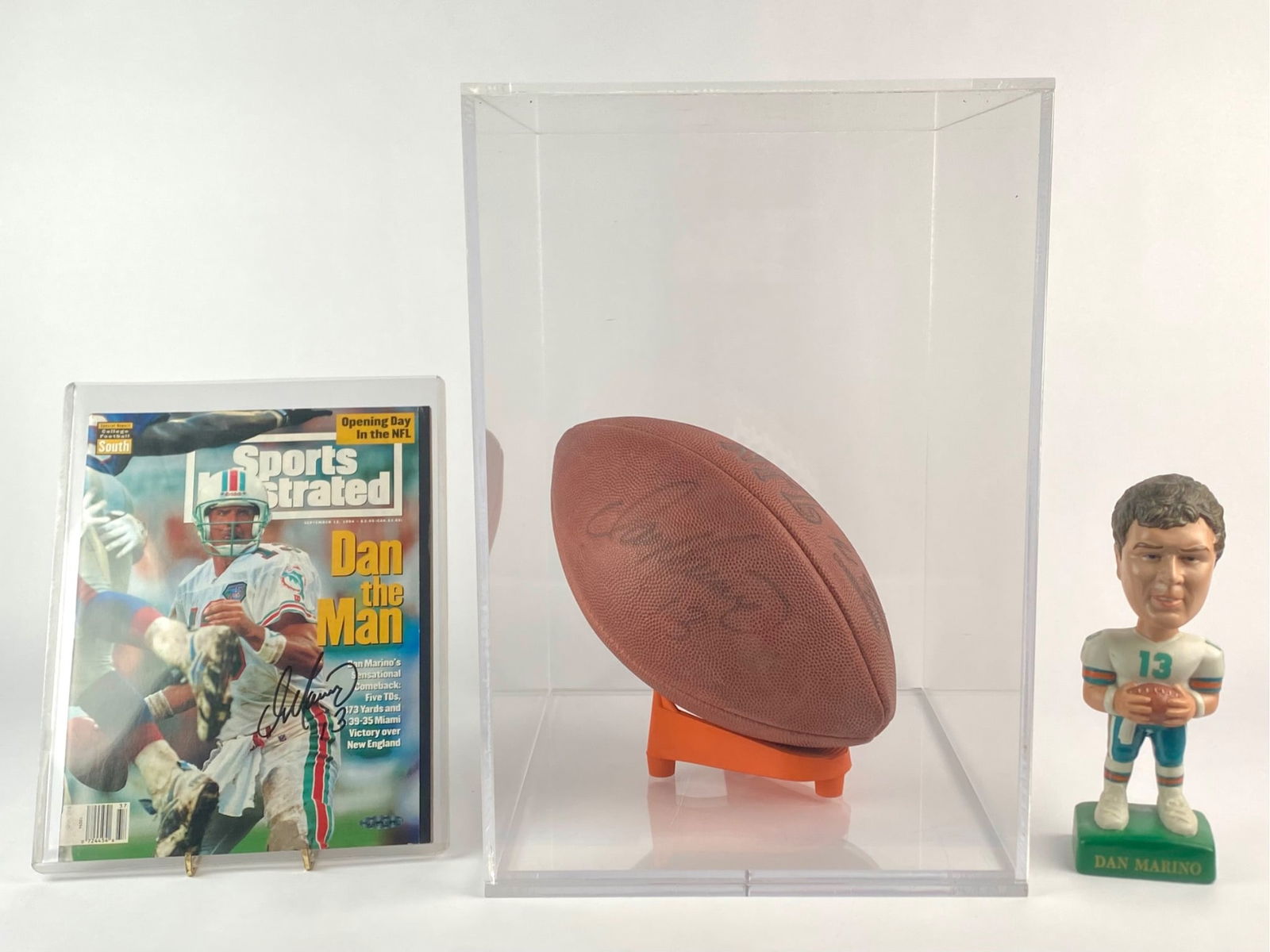 Dan Marino Signed Football and Sports Illustrated Magazine Set