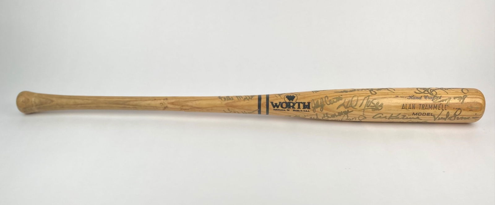 1991 Detroit Tigers Team-Signed Alan Trammell Model Bat: Worth "Alan Trammell" model bat, hand-crafted in Tennessee, signed by numerous Detroit Tigers players and coaches. Notable autographs include Cecil Fielder, Al Kaline, Frank Tanana, Alan Trammell, Wal