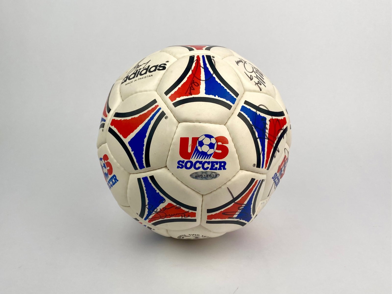 1994 U.S. Men's National Soccer Team Signed Adidas Ball includes a numbered hologram: Adidas “US Soccer” logo ball signed by members of the 1994 U.S. Men’s National Team. The signatures include several players and coaching staff from the roster, with clear examples such as Ma