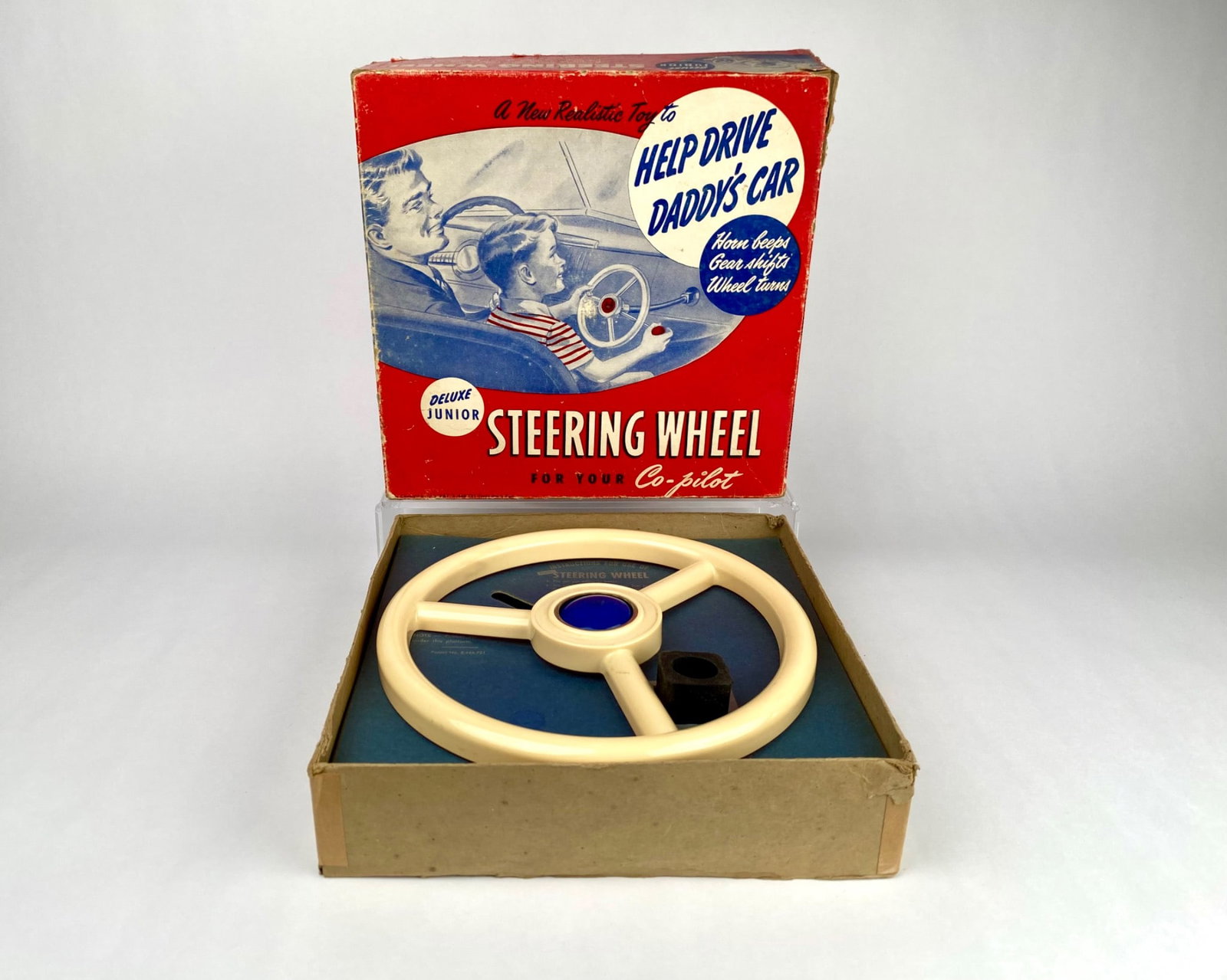 1950s Deluxe Junior Steering Wheel Co-Pilot Toy With Original Box: Statler Deluxe Junior Steering Wheel Co-Pilot toy, made in the USA by Statler Manufacturing Company, Chicago, Illinois. Includes original box with graphics and instructional insert. Toy components inc