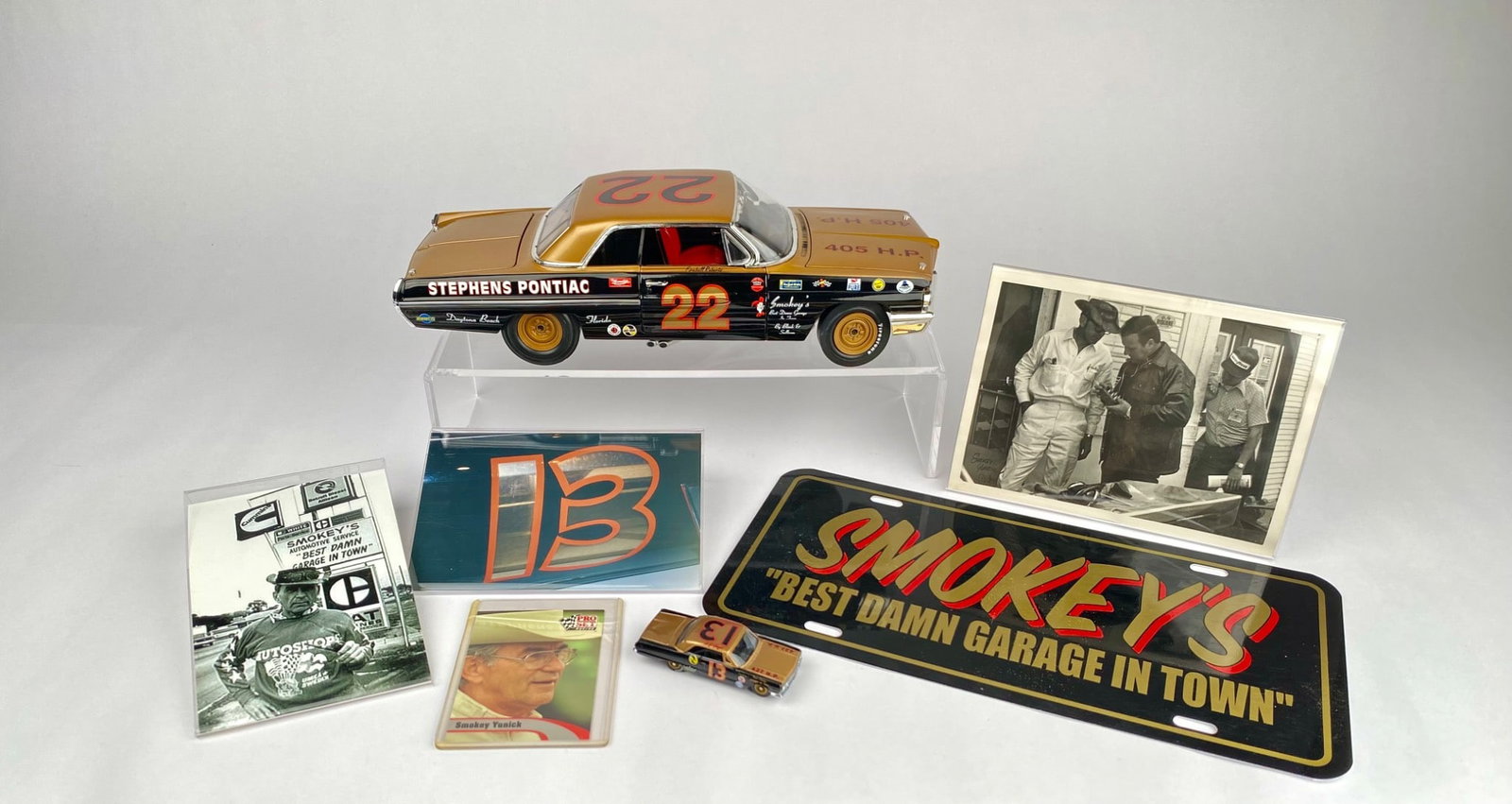 Smokey Yunick Memorabilia Collection, Including Model Cars and Ephemera: Smokey Yunick memorabilia. Includes a detailed model of a Stephens Pontiac #22 stock car with opening hood and trunk with original box, and a die-cast model of Smokey Yunick's #13 427 HP, a "Smokey's 
