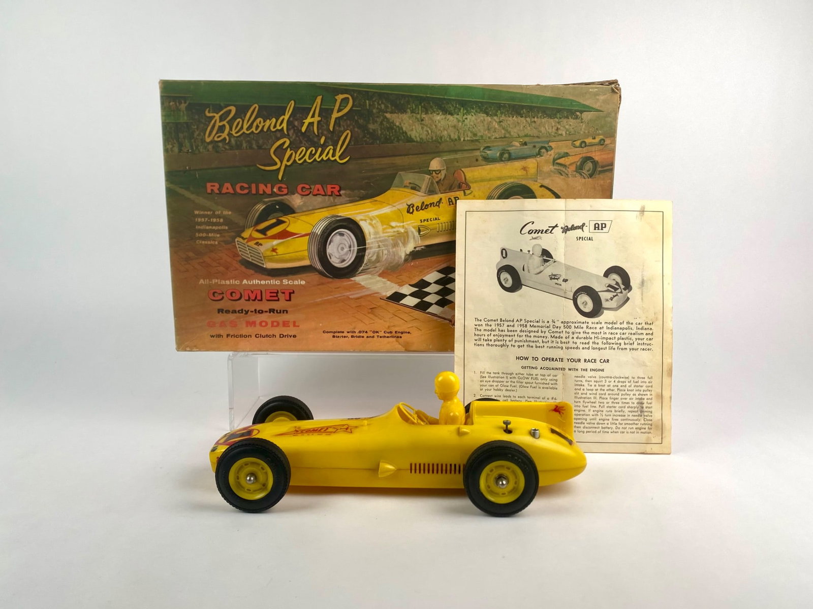 Comet Belond A.P. Special Racing Car with Original Box and Instructions: Vintage Comet Model Hobbycraft "Belond A.P. Special" tether racing car, a 3/4 scale replica of the car that won the Indianapolis 500 in 1957 and 1958. The model is constructed of yellow plastic with m