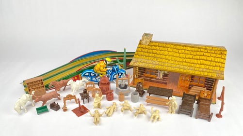 Vintage Tin and Plastic Toys Featuring Cabin, Motorcycle, and Figures