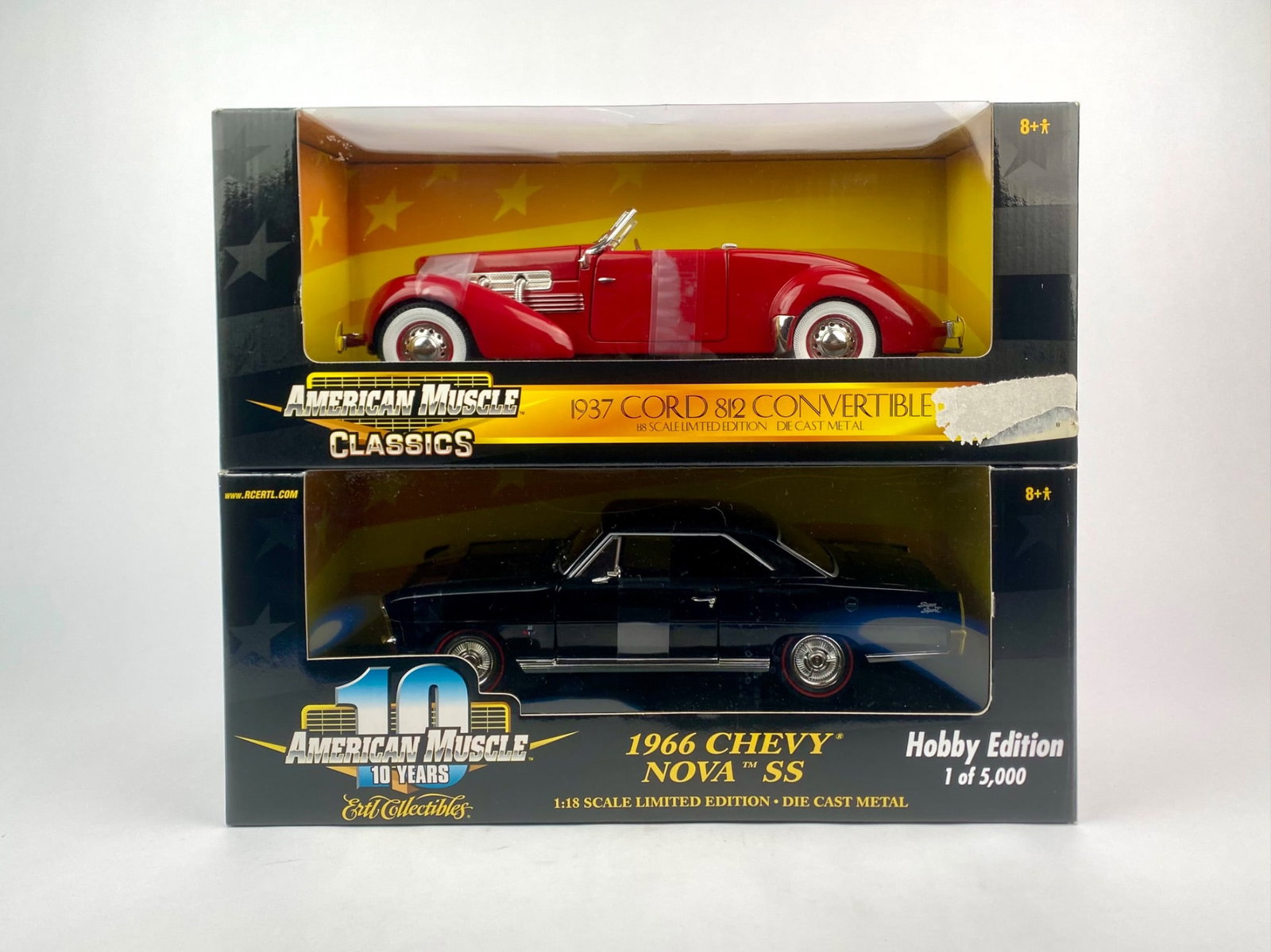 Set of Two Ertl American Made 1:18 Scale Die-Cast Cars, 1937 Cord 812 Convertible & 1966 Chevy Nova: Lot includes two Ertl Collectibles American Muscle 1:18 scale die-cast cars in original boxes. The first is a 1937 Cord 812 Convertible in red from the American Muscle Classics series. The box shows l