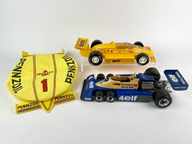 Lot of Two Vintage Indy and Formula 1 Die-Cast Cars with Pennzoil Cap