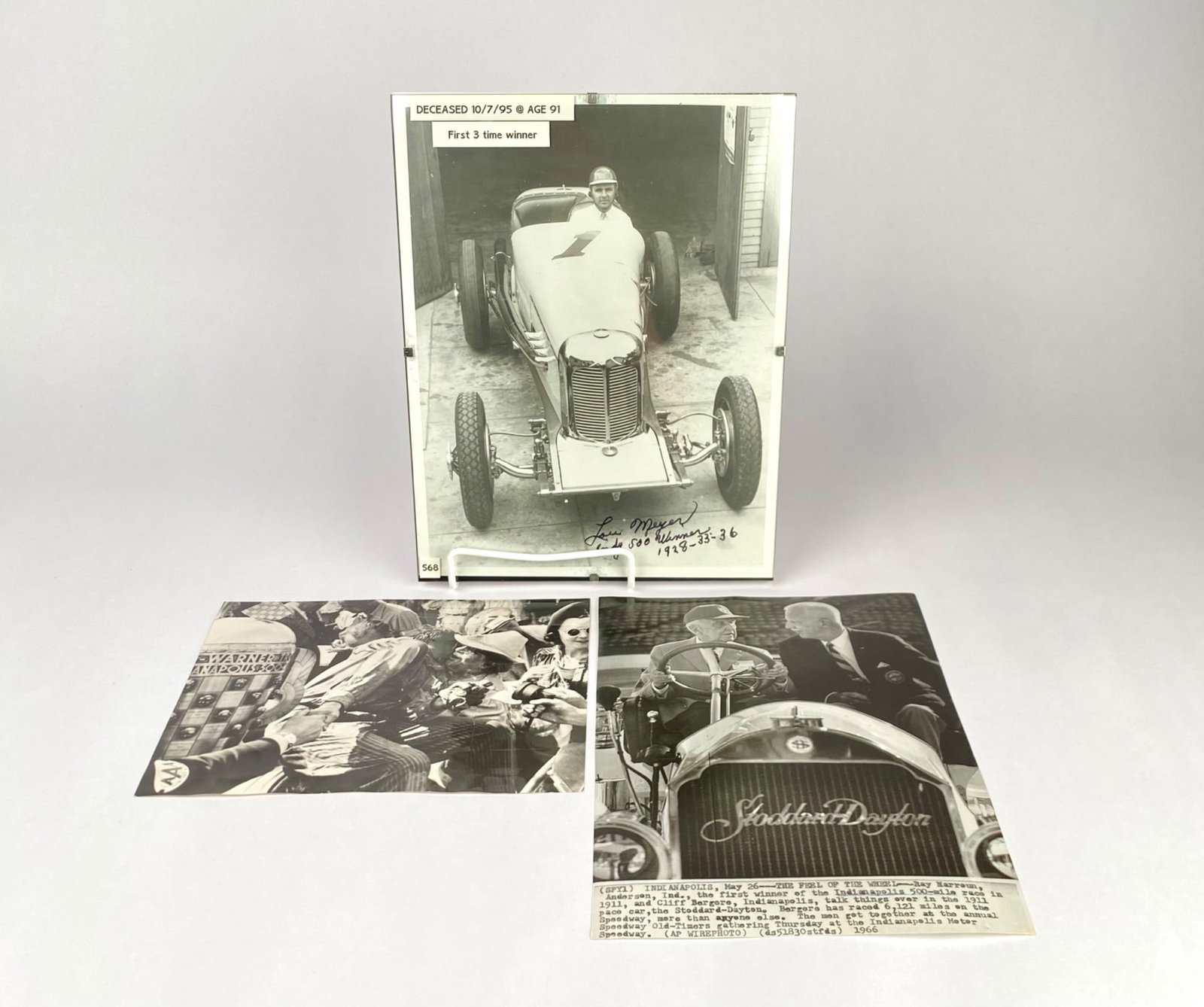 Indianapolis 500 Vintage Press Photo Lot; Shaw, Harroun & Meyer: Three black-and-white photographs related to auto racing. The first photograph is of an Indy 500 winning car and is signed with the caption "Lou Meyer, Indy 500 Winner, 1928-33-36." The second depicts