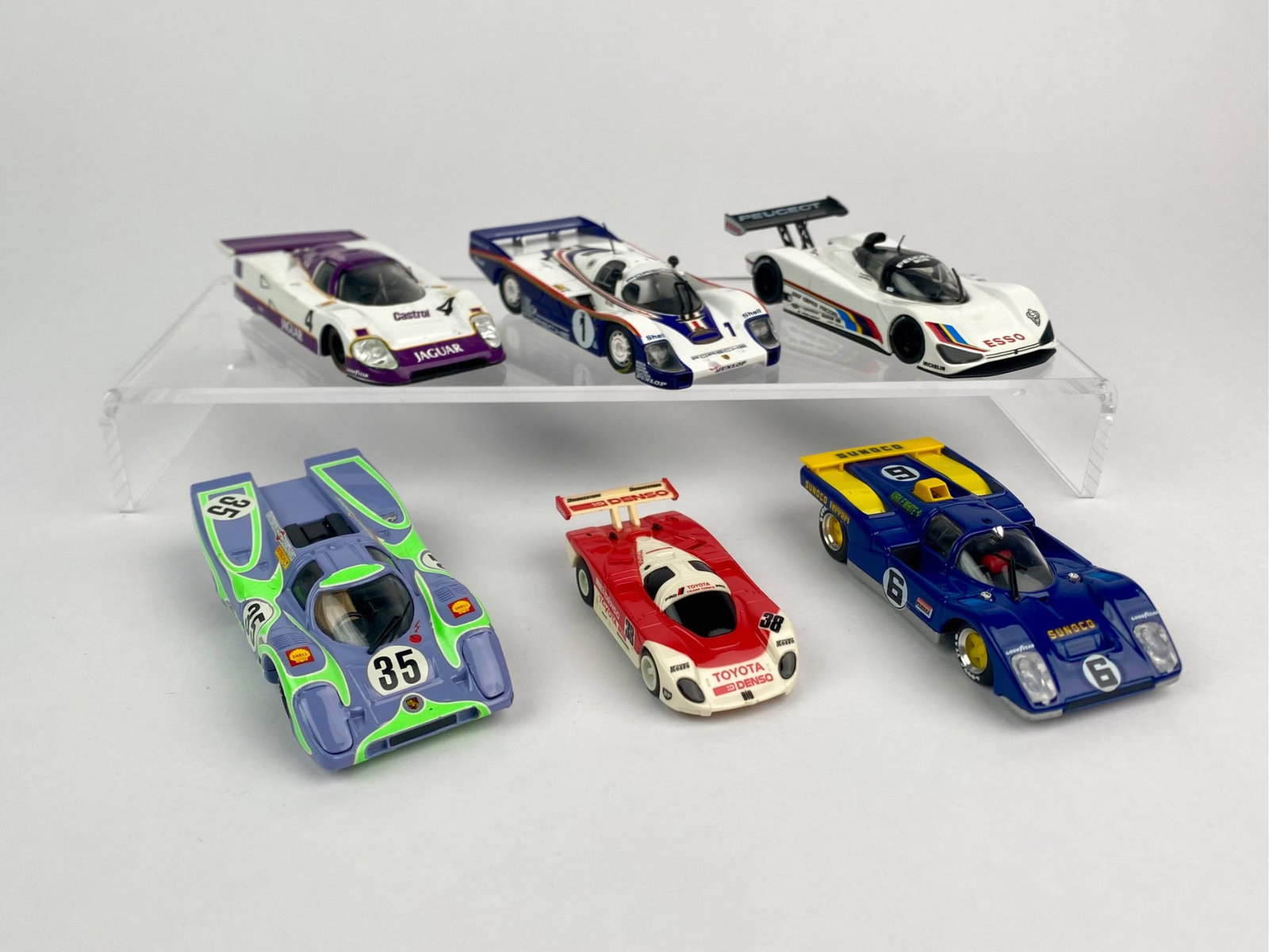 Set of Six 1:43 Scale Racing Die-Cast Car Models - Porsche, Ferrari, Toyota, Peuge: Lot of six mixed 1:43 scale diecast and slot-style racing car models. Included is a Porsche 917/20 "Pink Pig" by Best/Brumm, made in Italy, a Ferrari 512 in Sunoco blue and yellow livery, also Brumm, 