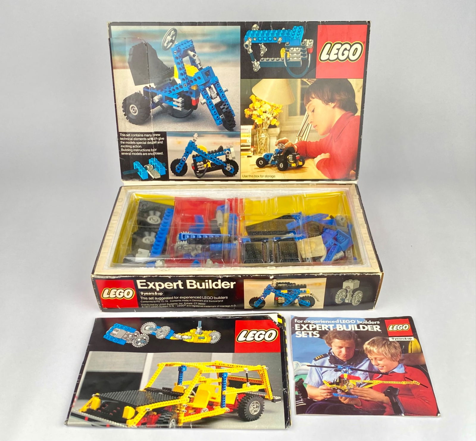 LEGO Expert Builder Set 948 Go-Kart With Box and Instructions: LEGO Expert Builder includes the original box, instruction booklet, and an additional LEGO Expert Builder series pamphlet. The set allows assembly of multiple models, with components featuring blue, b