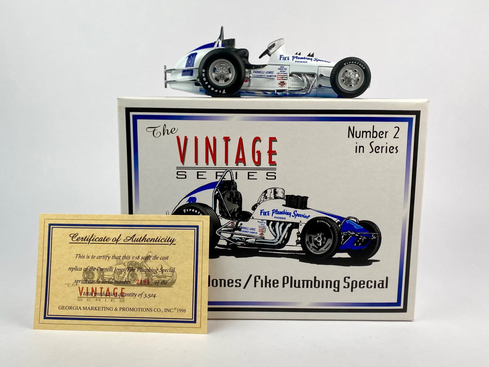 Parnelli Jones / Fike Plumbing Special 1:18 Scale Die-Cast Model (COA): 1:18 scale die-cast replica of the Parnelli Jones Fike Plumbing Special Sprint Cat, produced in 1998 by Georgia Marketing & Promotions as part of "The Vintage Series," number 2 in the series. The car 