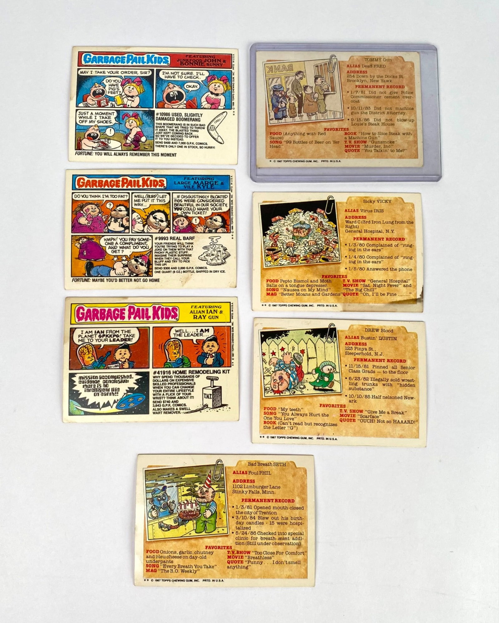 Lot of Garbage Pail Kids Trading Cards (Series 6, 7, and 8): 1980s Garbage Pail Kids trading cards featuring various characters, comics, and puzzle pieces. The lot includes primary cards with vibrant artwork as well as some cards showcasing incomplete puzzles o