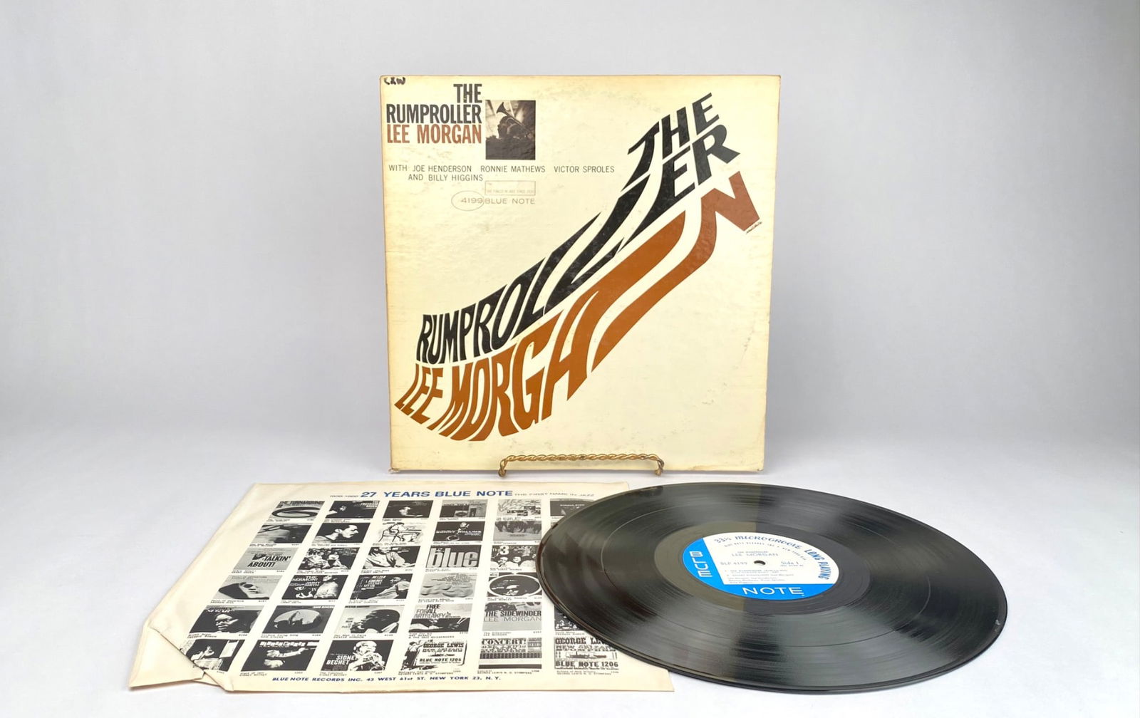 Lee Morgan Blue Note LP ‘The Rumproller’ 4199 33 1/3 RPM Record: Lee Morgan ‘The Rumproller’ LP, Blue Note 4199, featuring Lee Morgan on trumpet, Joe Henderson on tenor sax, Ronnie Mathews on piano, Victor Sproles on bass, and Billy Higgins on drums. High Fidel