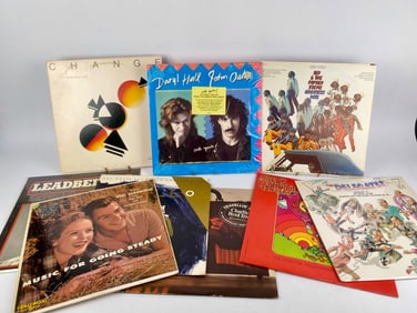 Set of Ten Vintage Vinyl Records featuring Sly & The Family Stone, Hall & Oates, and Others