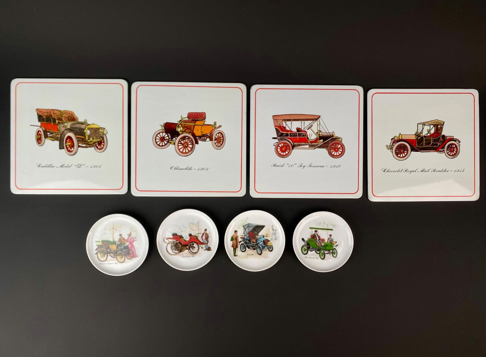 Vintage Automotive Themed Coasters and Plate Set: Collectible set of vintage automotive themed coasters and plates, featuring early 20th century vehicles. This set includes four square coasters and four round plates, each adorned with illustrations o