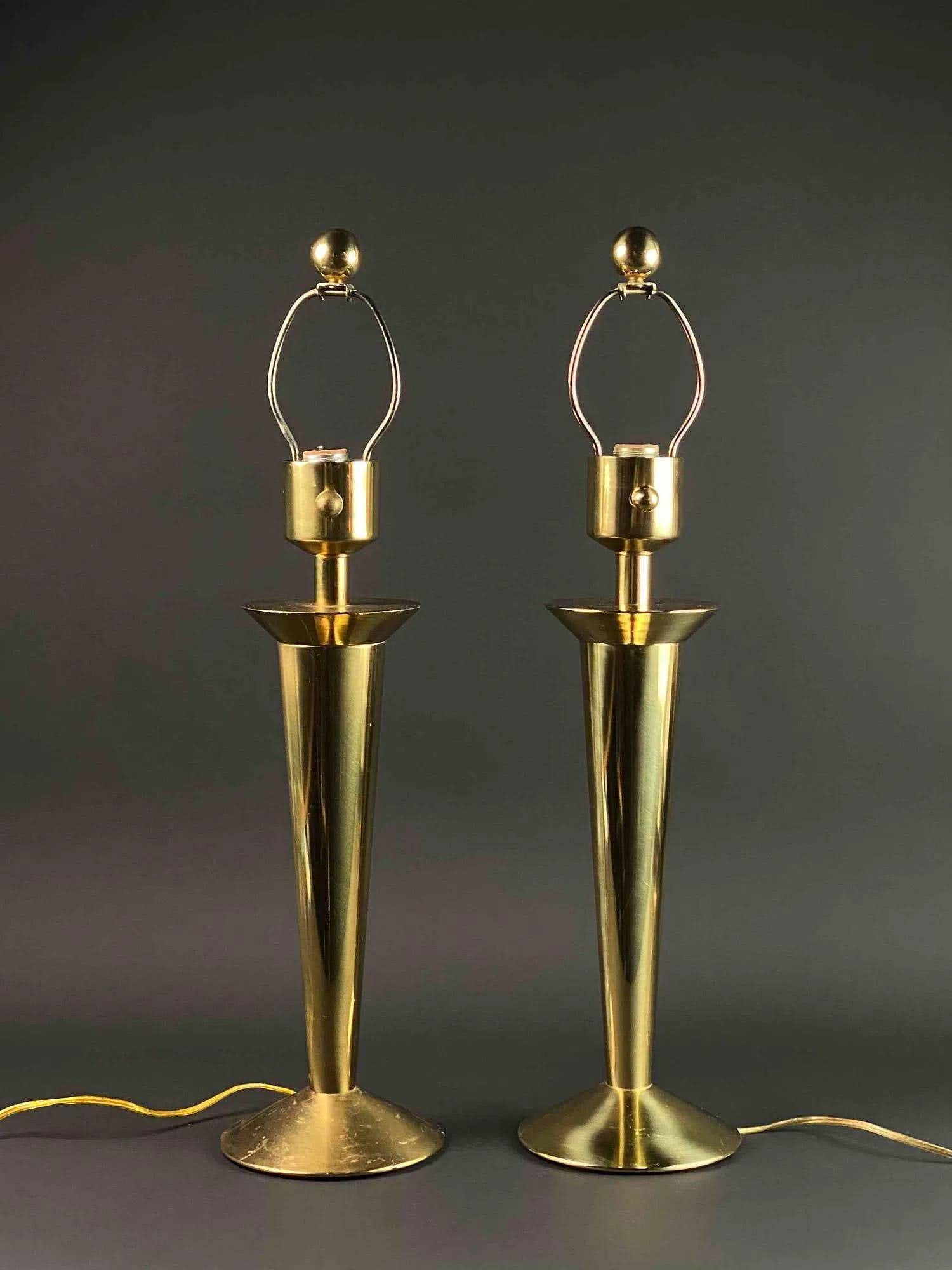 Pair of Northbrook Stiffel Brass Lamps: A pair of Northbrook Stiffel brass lamps. Heavy solid brass torch lamp with harps. Mid century regency design. Both lamps are in tested working condition. Lamps are in good condition with signs of wea