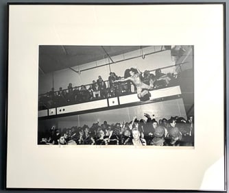 Framed Black-and-White Photograph Depicting a Concert Crowd Scene