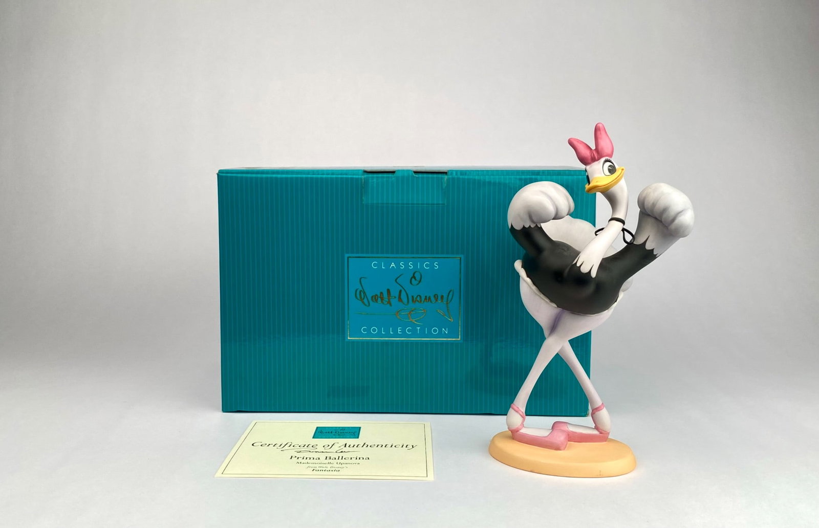 Walt Disney Classics Collection "Prima Ballerina" Figurine with Box & COA: Walt Disney Classics Collection figurine titled 'Prima Ballerina - Mademoiselle Upanova' from Disney's Fantasia. The figurine is crafted from hand-painted porcelain and displays the signature 'WDCC' m