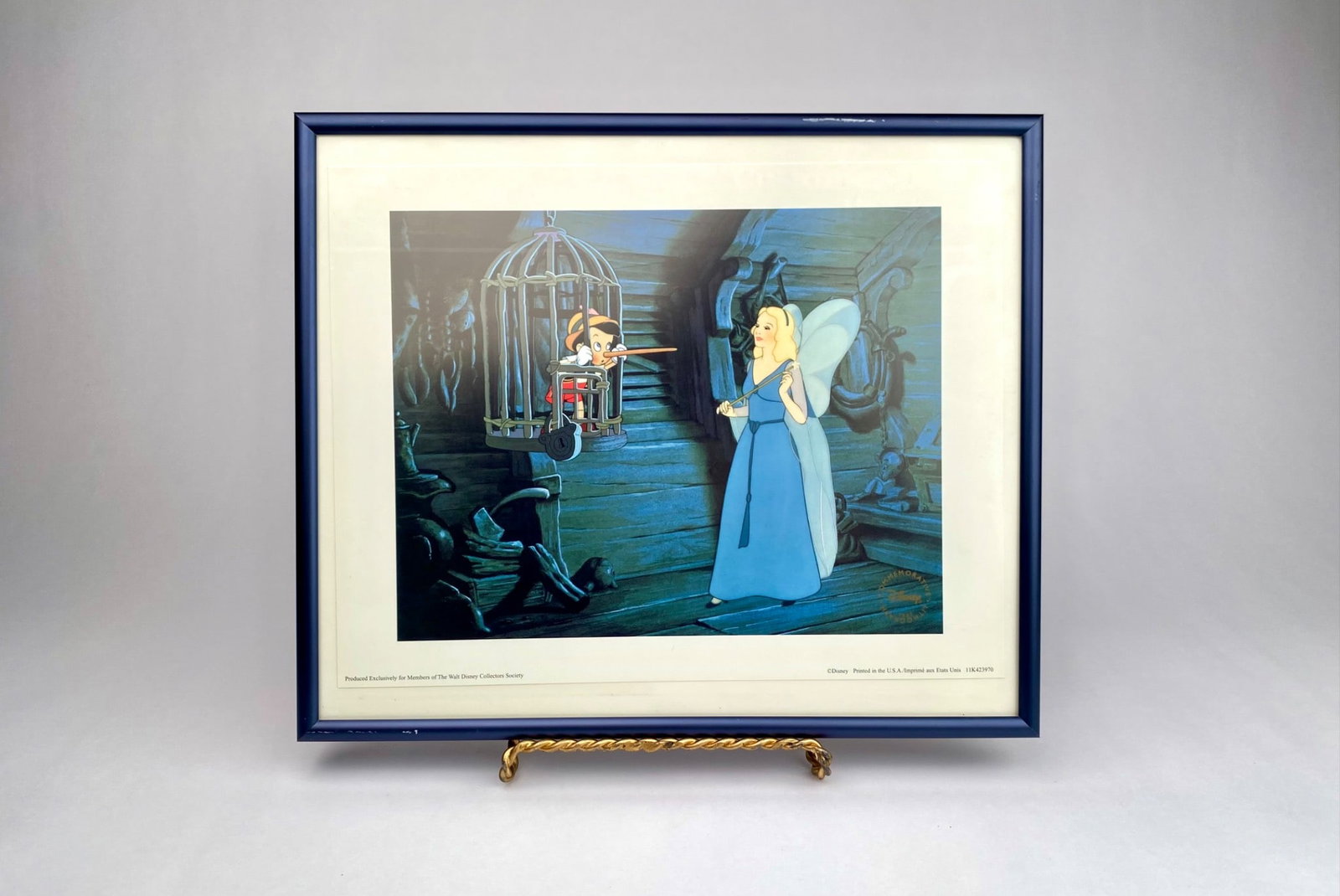 Walt Disney Collector's Society 'Pinocchio and the Blue Fairy' 1997 Commemorative Lithograph: Walt Disney Collector's Society commemorative lithograph titled 'Pinocchio and the Blue Fairy,' produced in 1997. Printed in the USA, it includes the official Disney Medallion seal. Issued exclusively