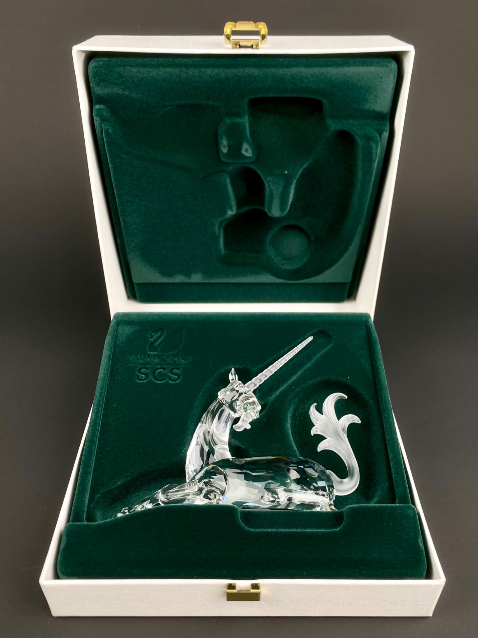 Swarovski SCS 1996 Annual Edition ‘Fabulous Creatures Unicorn’ Figurine (COA Original Box): 1996 Swarovski Crystal Society (SCS) Annual Edition “Fabulous Creatures – The Unicorn,” designed by Martin Zendron and released exclusively to the SCS members. The unicorn is crafted in clea