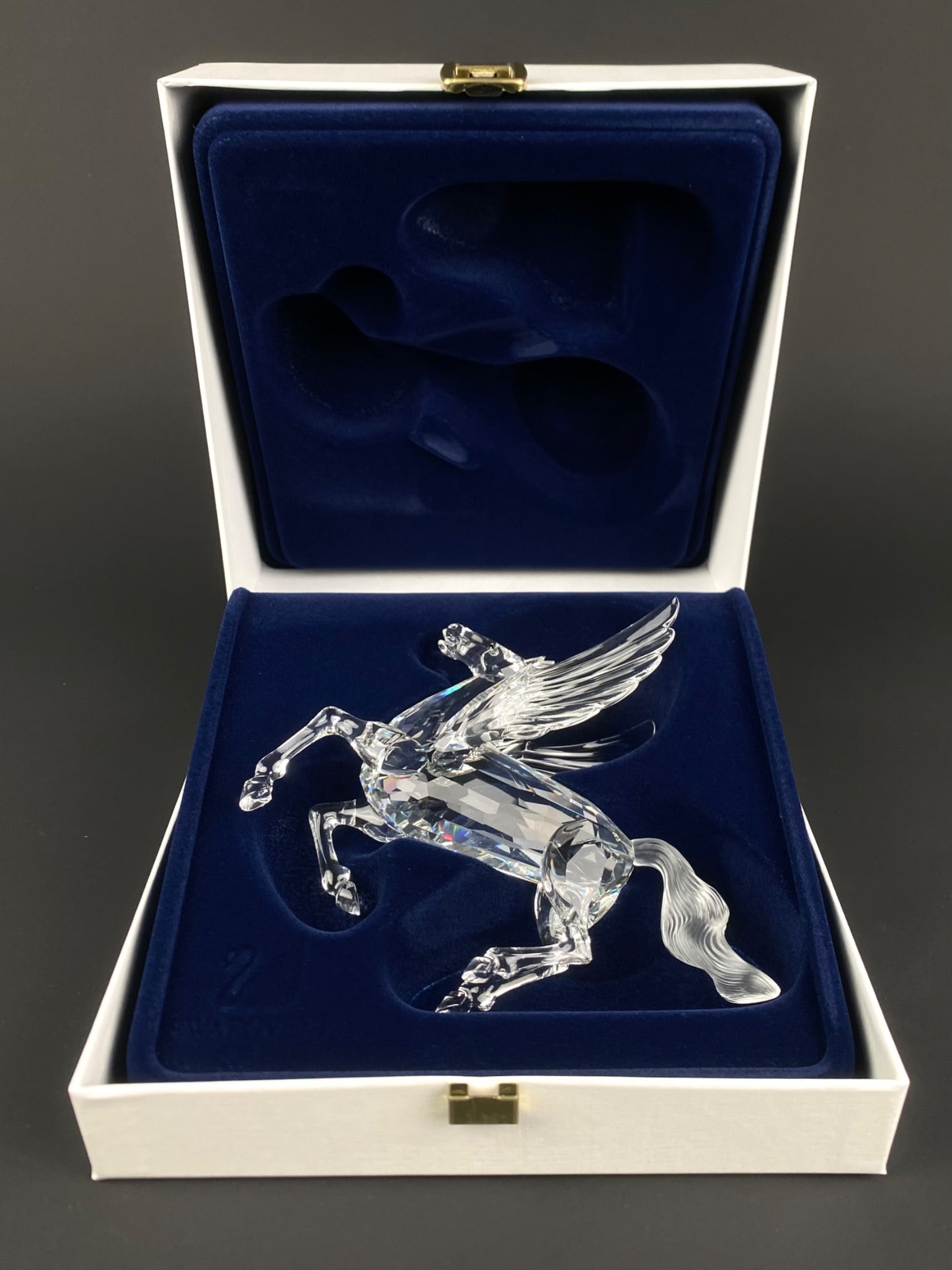 Swarovski SCS 1998 Annual Edition ‘Fabulous Creatures Pegasus’ Figurine (COA Original Box): 1998 Swarovski Crystal Society (SCS) Annual Edition “Fabulous Creatures – The Pegasus,” designed by Adi Stocker and released exclusively to SCS members. The figurine is crafted in clear face