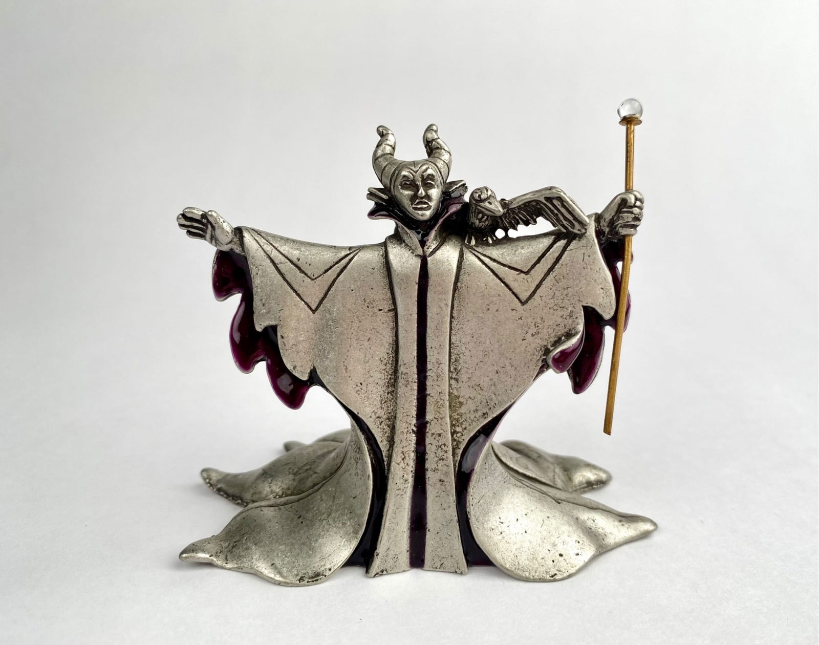 Disney Catalog Villains Collection ‘Maleficent’ Pewter Figurine (COA & Original Box): Limited edition pewter sculpture of ‘Maleficent’ from the Disney Villains Collection by the Disney Catalog, numbered 0456 of 2000. Hand-painted details include her black and silver robe with accen