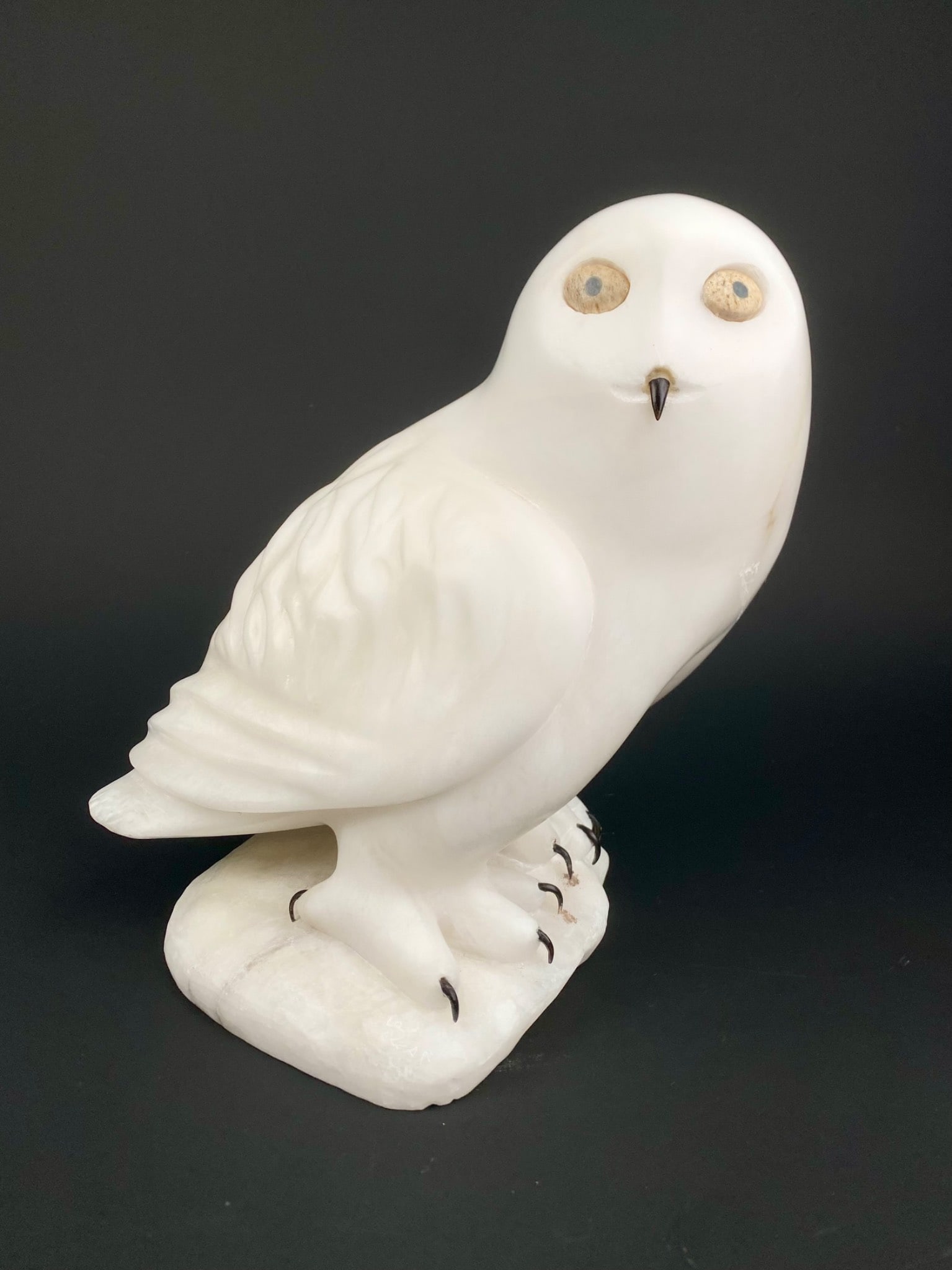 Manasie Akpaliapik (Inuit, Ikpik) Snowy Owl Sculpture: Carved snowy owl sculpture by Inuit artist Manasie Akpaliapik from Ikpik, Nunavut and known for his detailed sculpture work and incorporating organic materials into his work. This piece is carved from