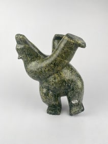Isaaci Petaulassie (Inuit, Cape Dorset) Serpentine 'Diving Bear' 2011