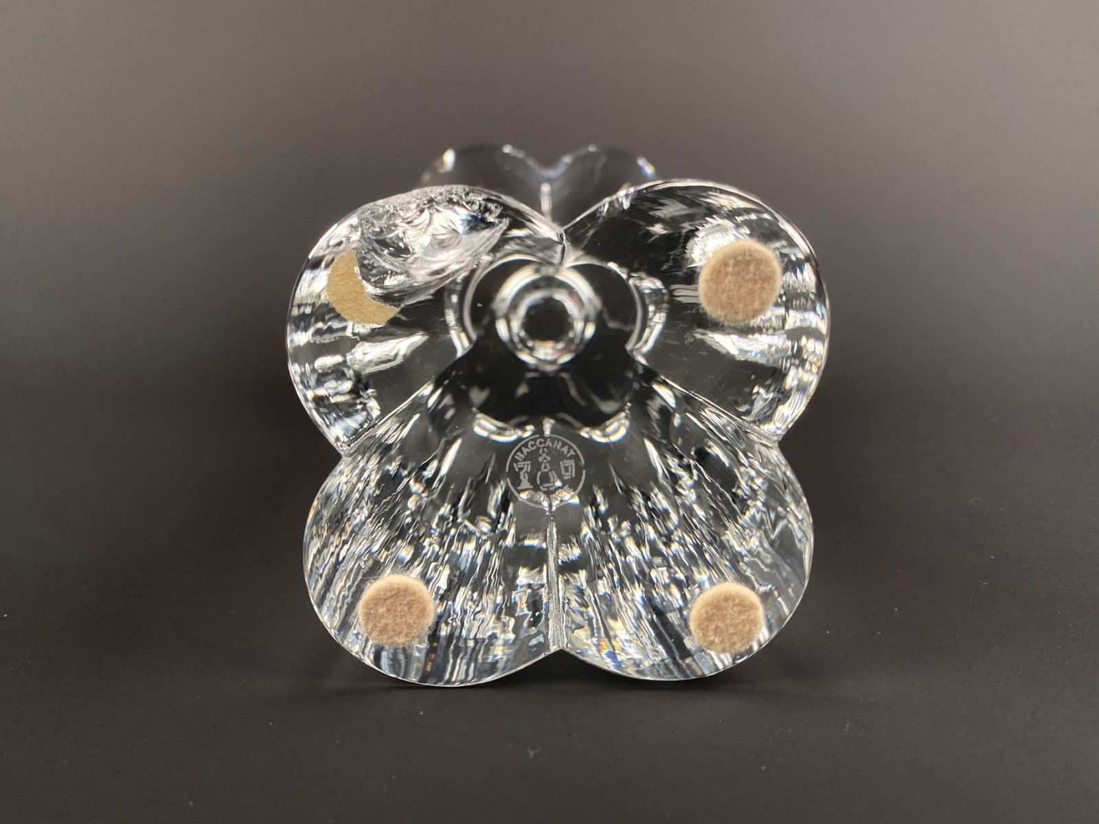 Pair of Baccarat ‘Diomede’ Crystal Candlesticks: Pair of Baccarat crystal candlesticks, crafted in France and signed on the base with the Baccarat hallmark. Both in the ‘Diomede’ style with a clover-form candles cup and conforming base joined by