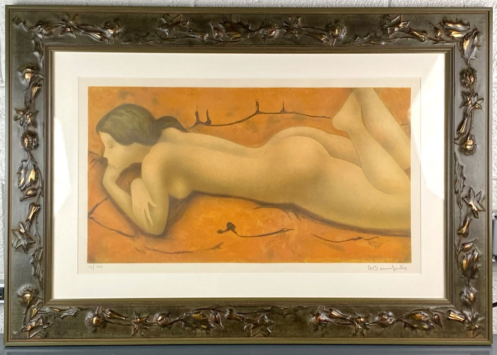 Alain Bonnefoit Signed Limited Edition Lithograph Nude (12/175): Signed and numbered limited edition lithograph by French artist Alain Bonnefoit. The print features a reclining nude woman with flowing hair set against an orange-toned background. It is pencil signed