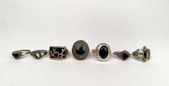 Seven Sterling Silver Rings with Black Stone Accents