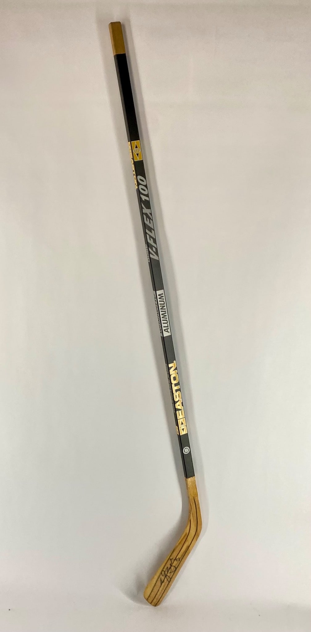 Brendan Shanahan Signed Easton V-Flex 100 Aluminum Hockey Stick: Easton V-Flex 100 Aluminum hockey stick with wooden blade, autographed by Hockey Hall of Famer Brendan Shanahan. The blade is factory stamped with “Shanahan Hand Made Pro Pattern” and the name
