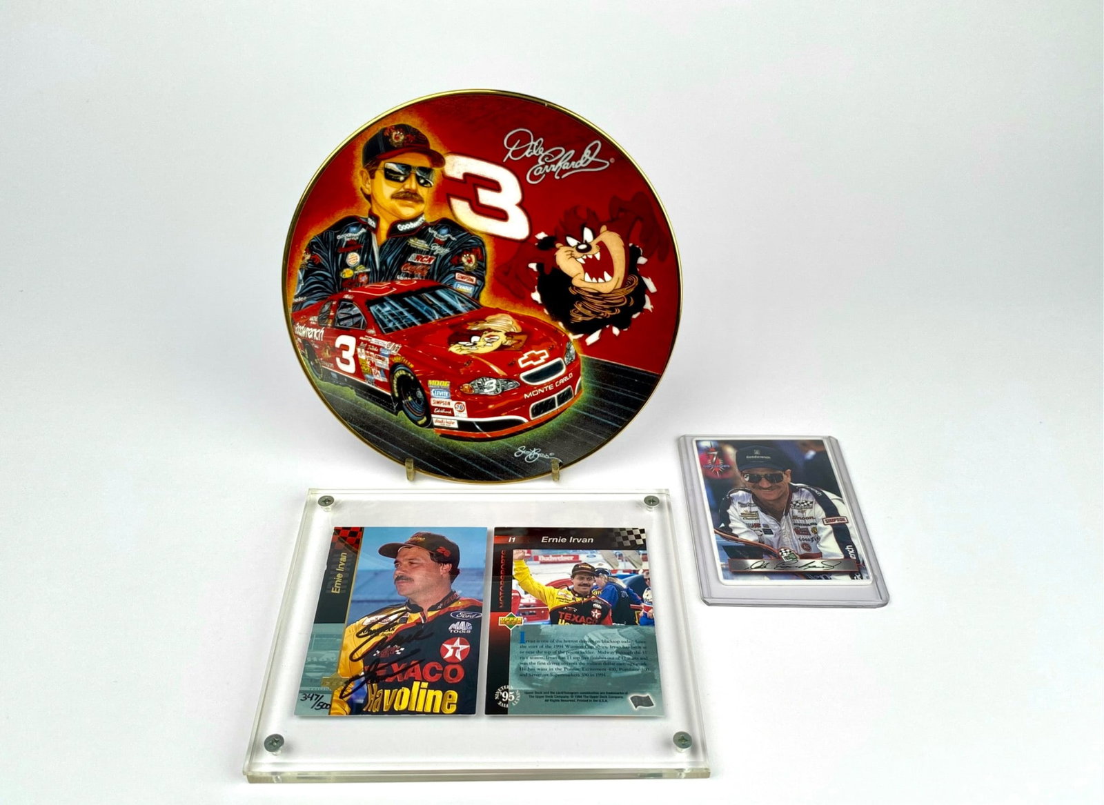 Dale Earnhardt and Ernie Irvan NASCAR Memorabilia Set: Motorsports memorabilia collection featuring a limited edition “Hot Property!” Dale Earnhardt collectible plate by Motorsports Editions, numbered 13125, with vibrant artwork depicting Dale Ear
