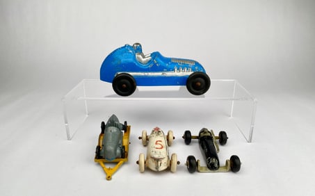Four Vintage Diecast Racing Cars and One Trailer