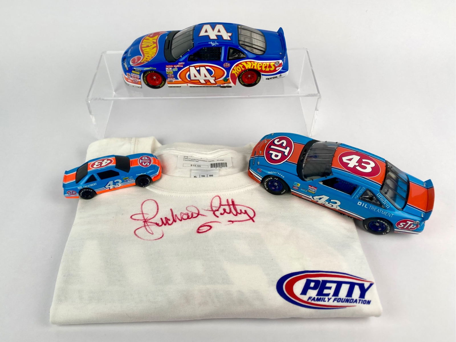 Richard Petty Signed Petty Family Foundation Shirt with STP and Hot Wheels Pontiac Grand Prix (1 of 12)
